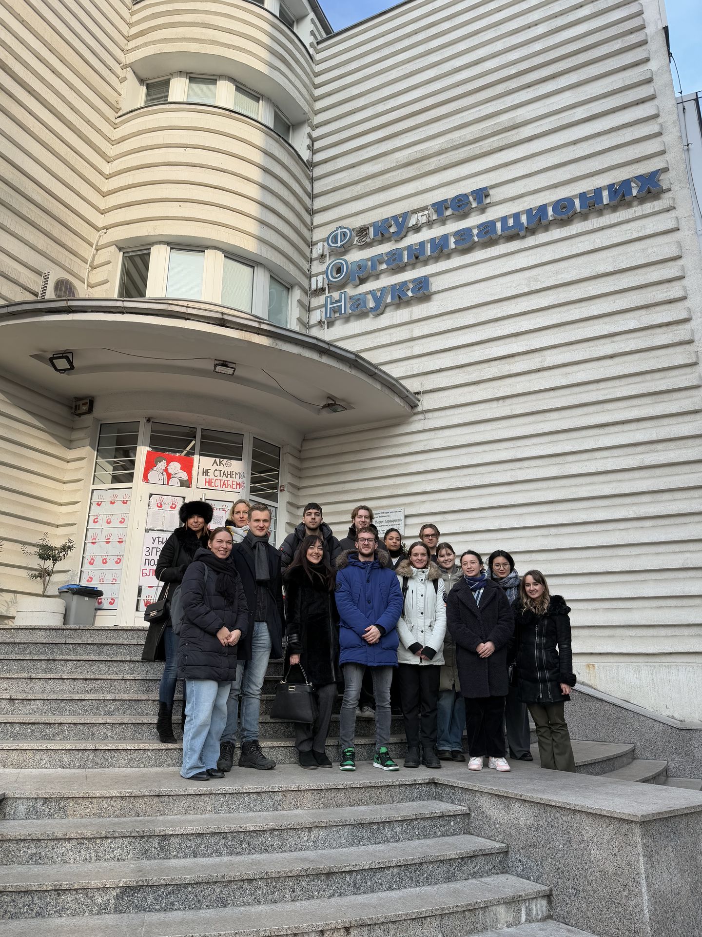 Gruppenfoto auf einer Treppe